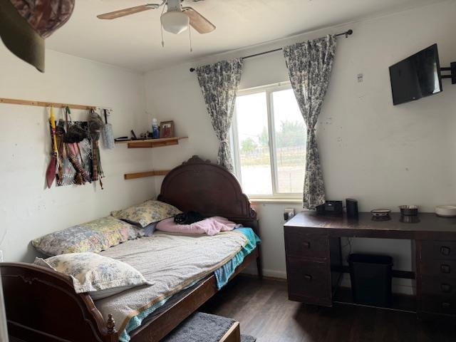 851 21 Road Fruita, CO 81521 - Photo 13 of 17 a bedroom with a bed and a window