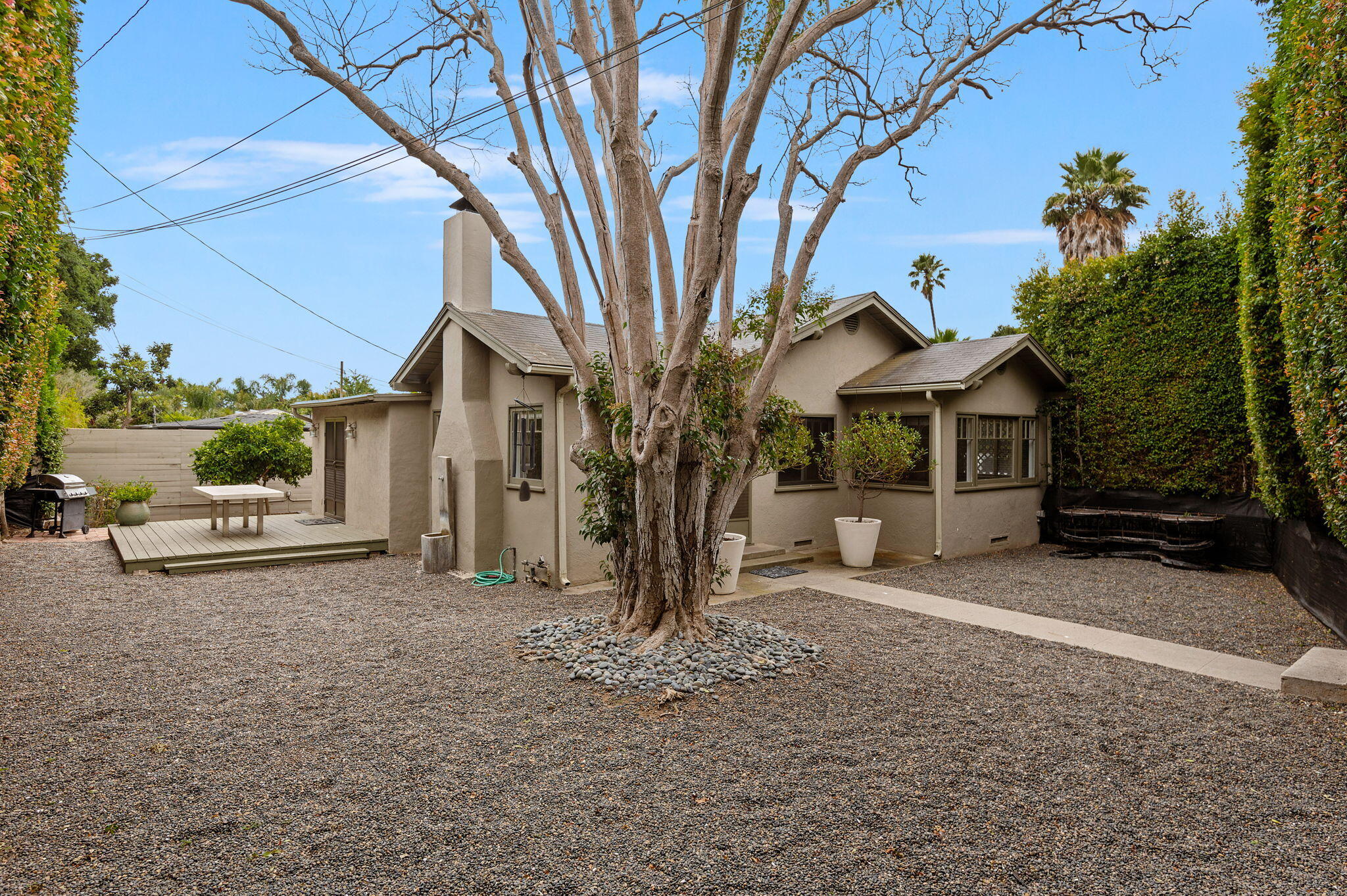1375 Virginia Road Santa Barbara, CA 93108 - Photo 12 of 37 a view of a house with a tree in front