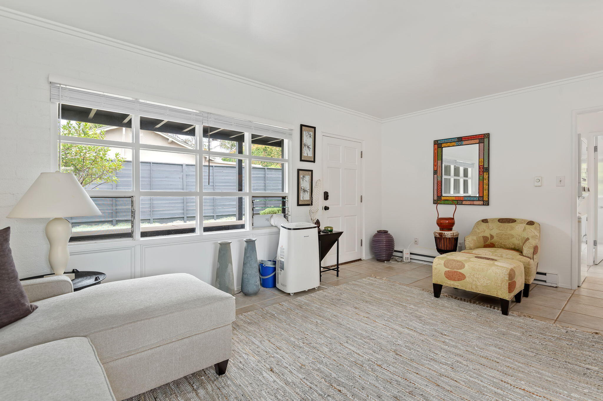 1375 Virginia Road Santa Barbara, CA 93108 - Photo 14 of 37 a living room with furniture and a large window