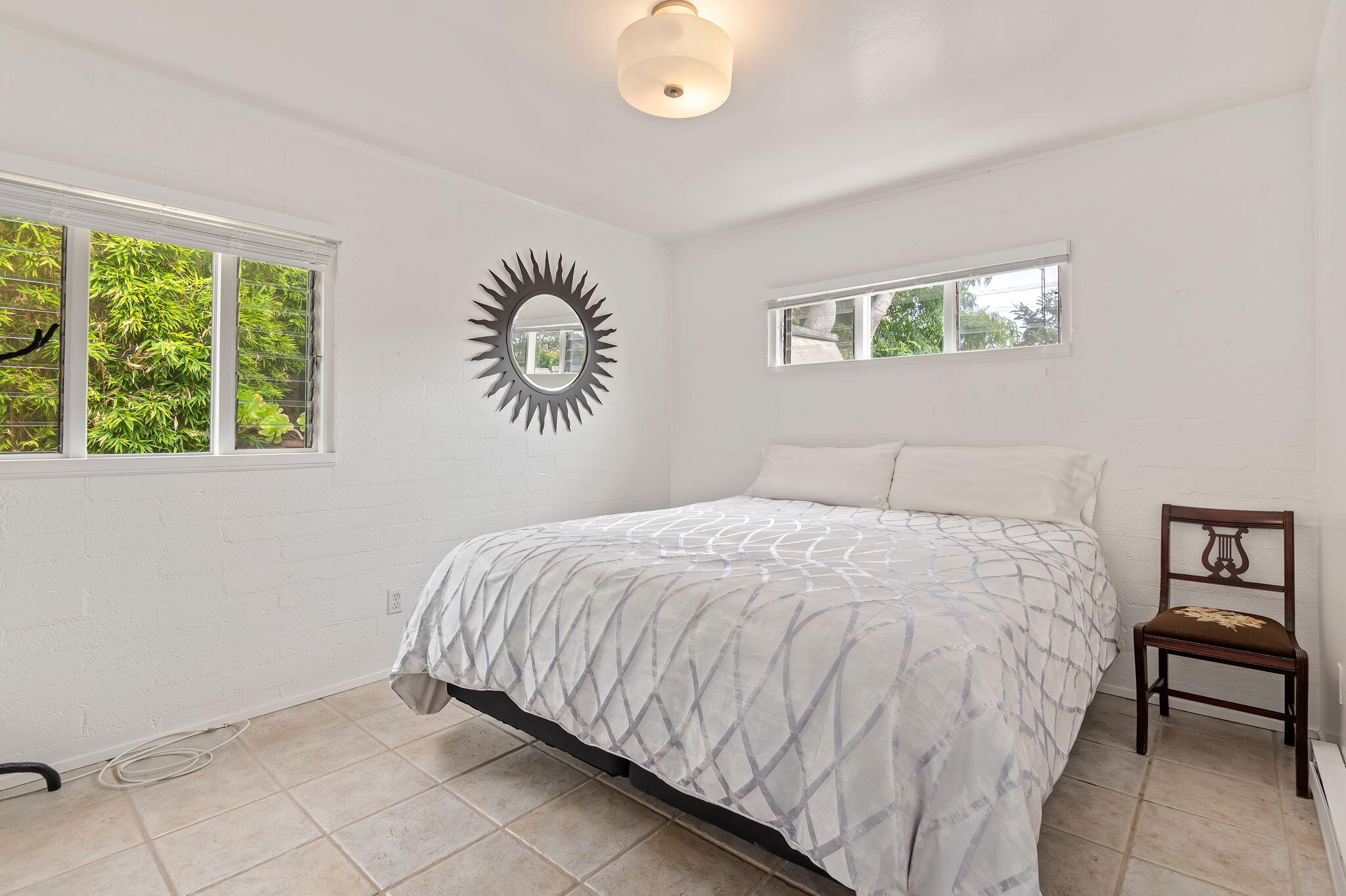 1375 Virginia Road Santa Barbara, CA 93108 - Photo 18 of 37 a bedroom with a bed and a window
