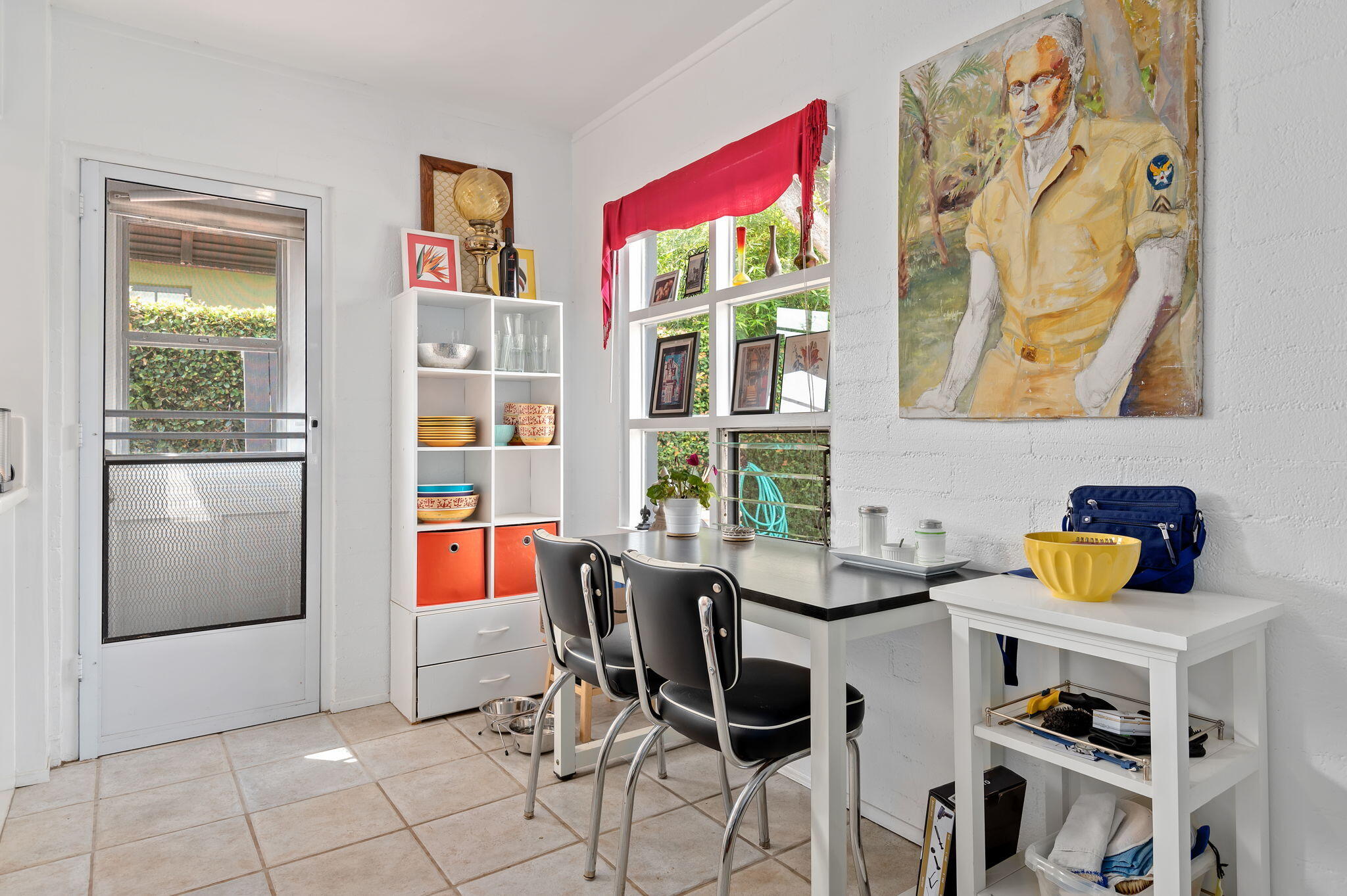 1375 Virginia Road Santa Barbara, CA 93108 - Photo 26 of 37 a dining room with furniture and a window