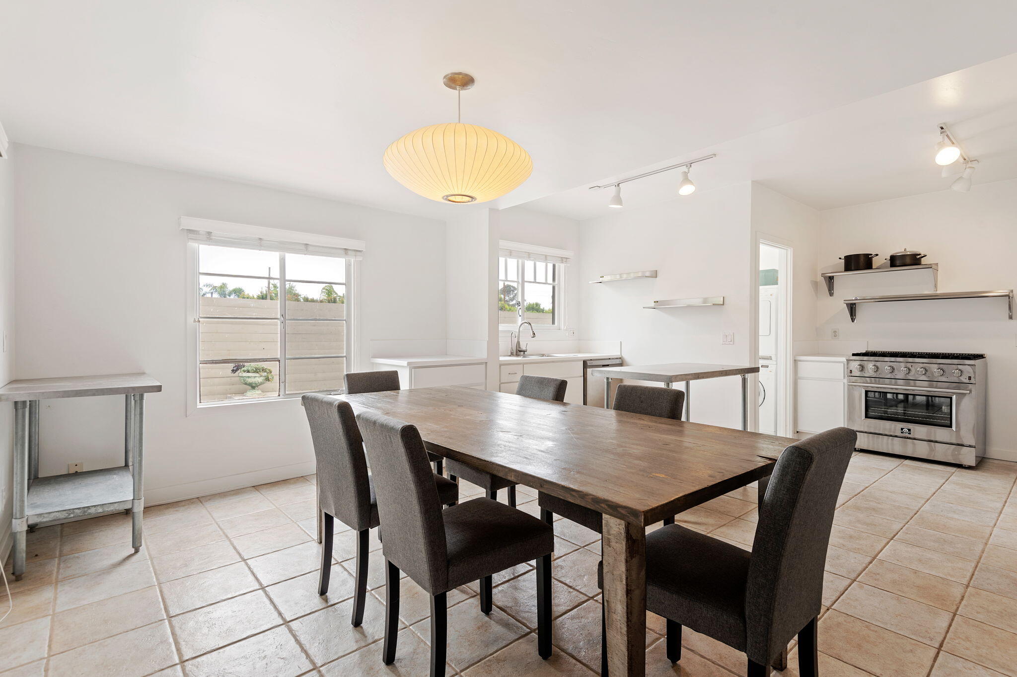 1375 Virginia Road Santa Barbara, CA 93108 - Photo 5 of 37 a view of a dining room with furniture and a chandelier