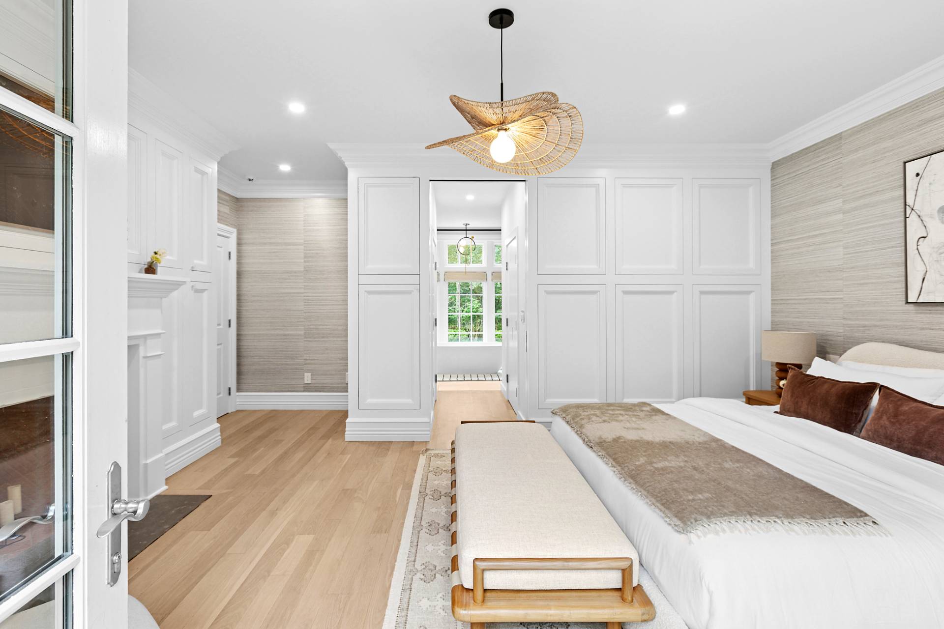 8 Barclay Court East Hampton, NY 11937 - Photo 20 of 48 a spacious bedroom with a bed and a window
