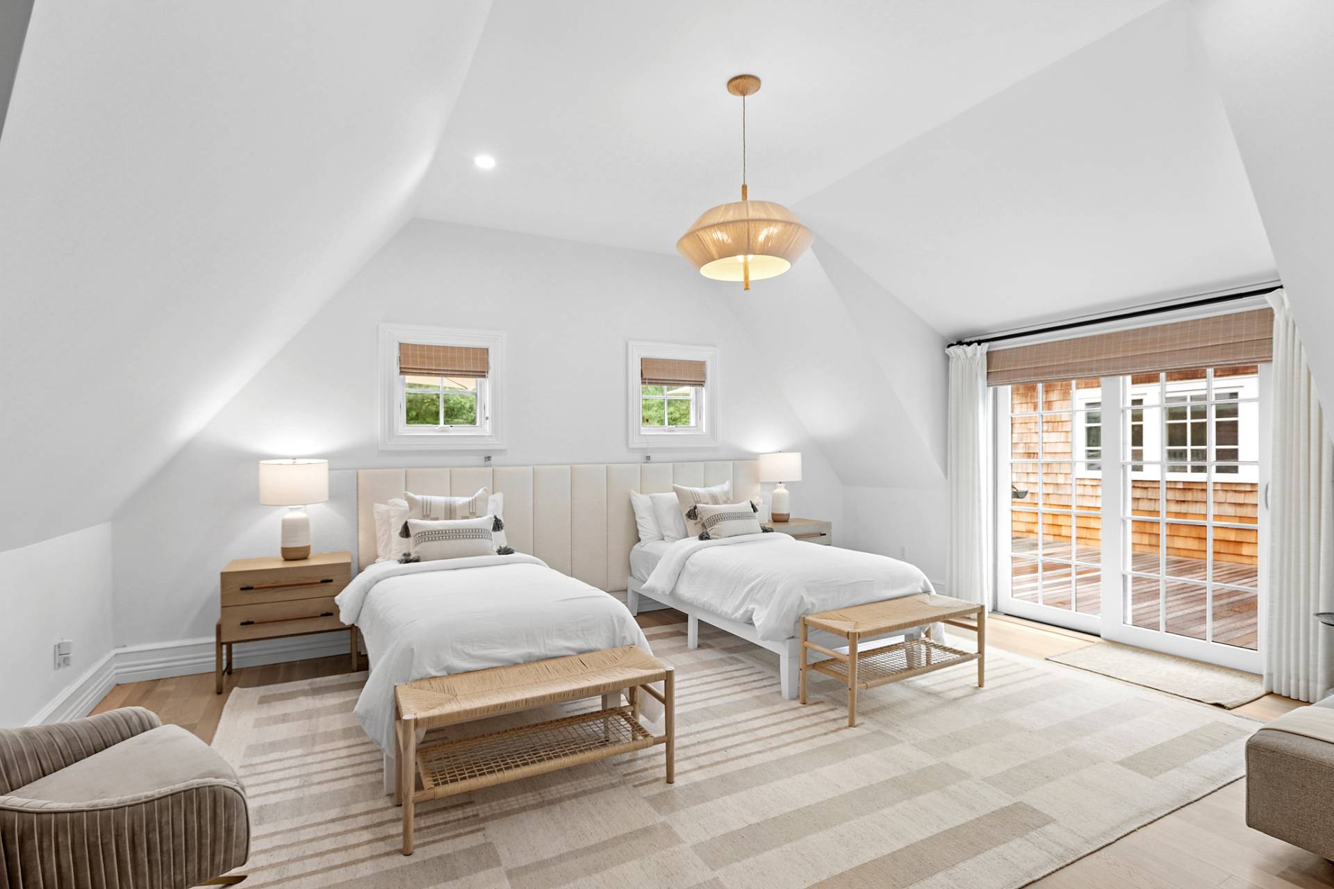 8 Barclay Court East Hampton, NY 11937 - Photo 32 of 48 a bedroom with furniture and a large window