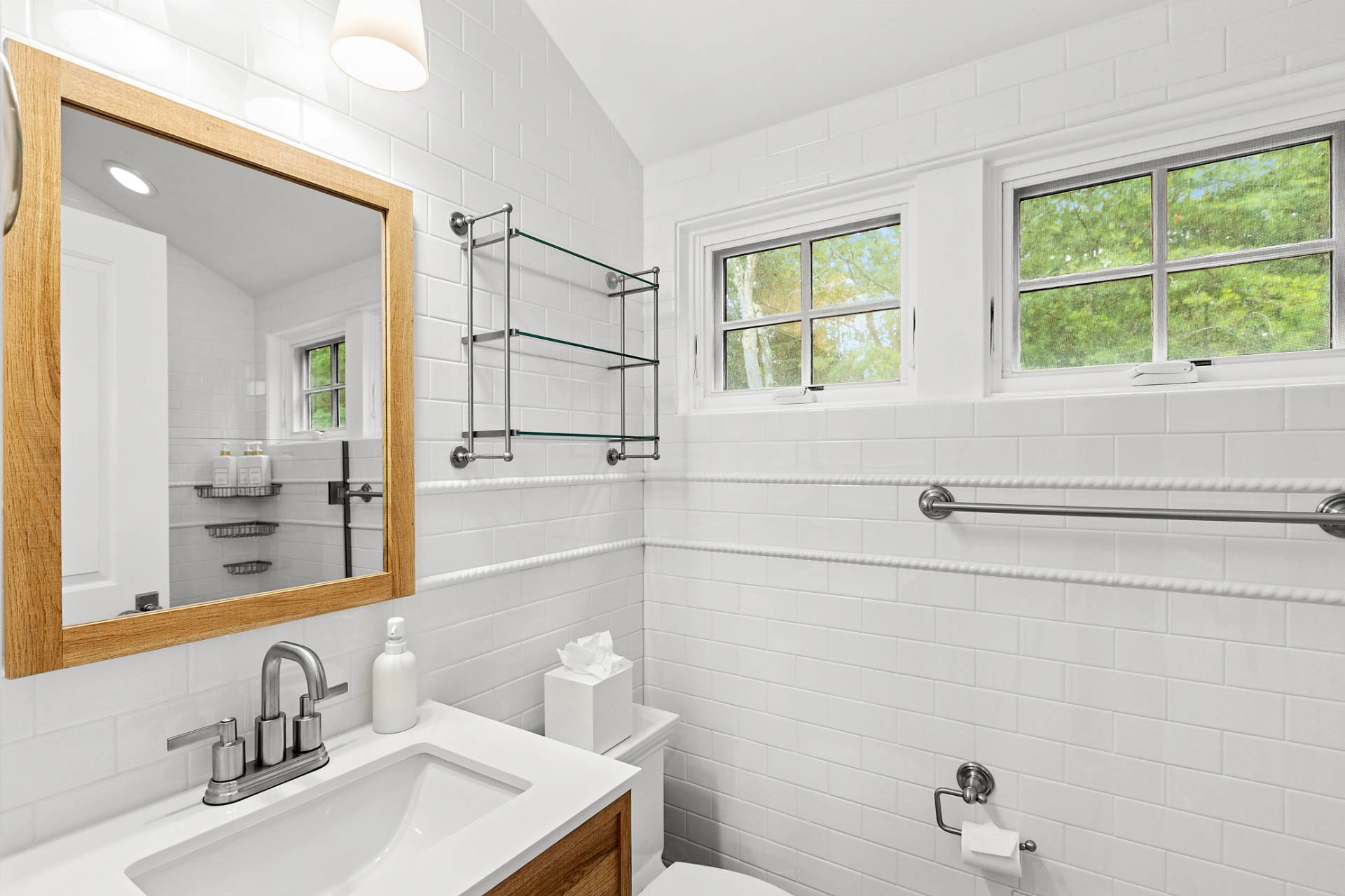 8 Barclay Court East Hampton, NY 11937 - Photo 35 of 48 a bathroom with a sink and a mirror