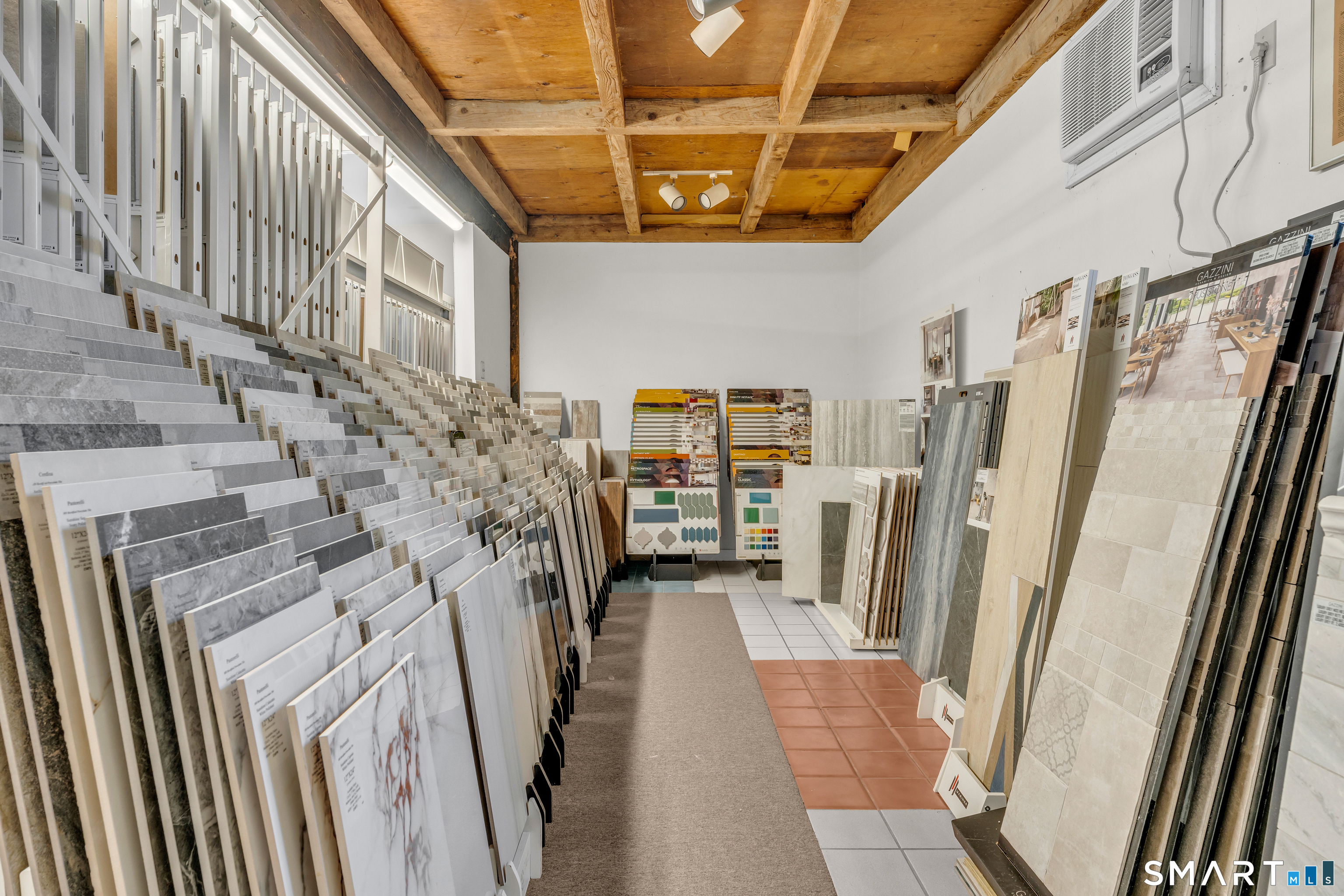51 Mill Road Guilford, CT 06437 - Photo 18 of 28 a view of a porch with furniture