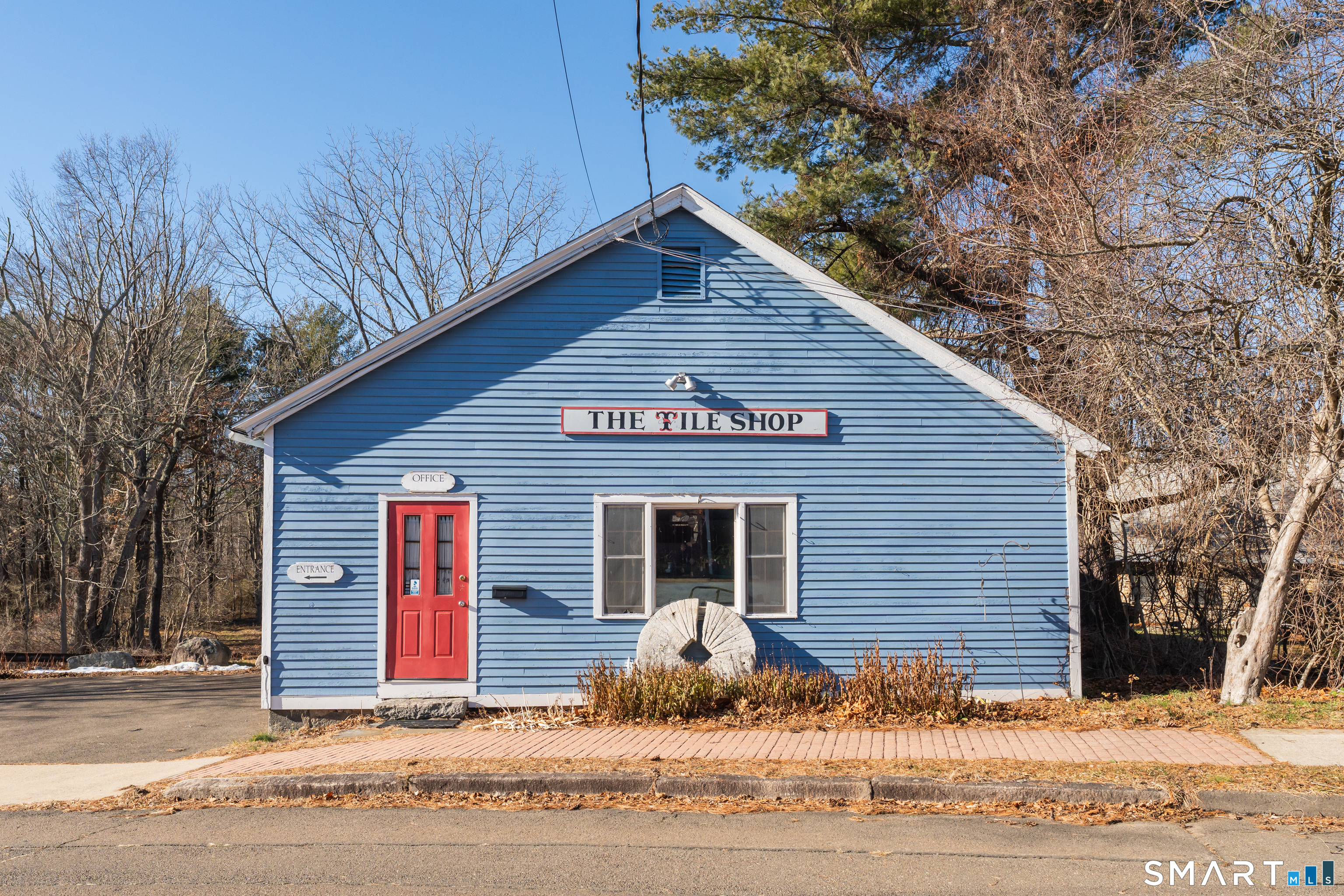 51 Mill Road Guilford, CT 06437 - Photo 27 of 30 a front view of a house with a yard