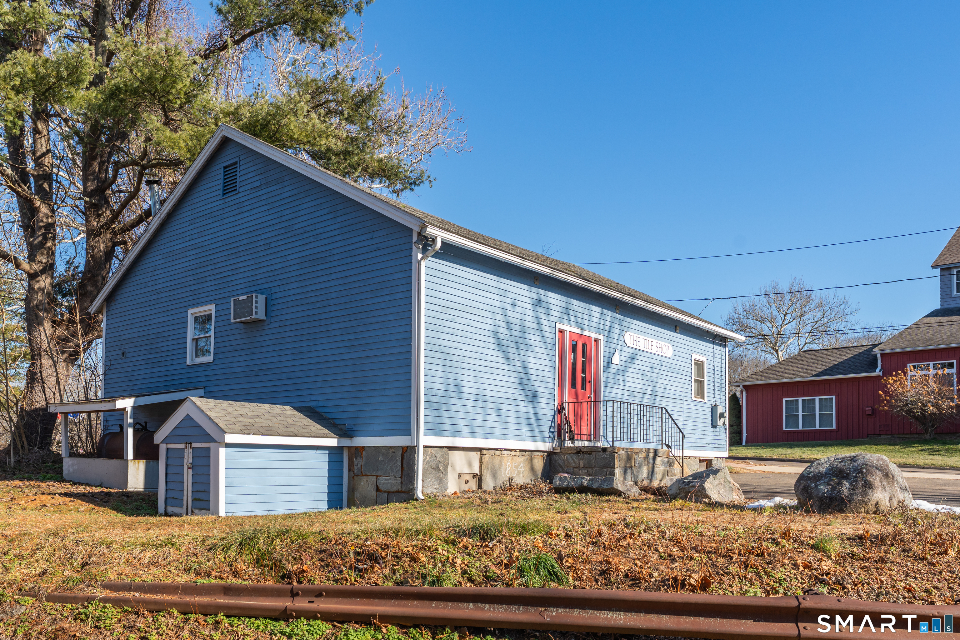 51 Mill Road Guilford, CT 06437 - Photo 28 of 28 a view of a house with a yard