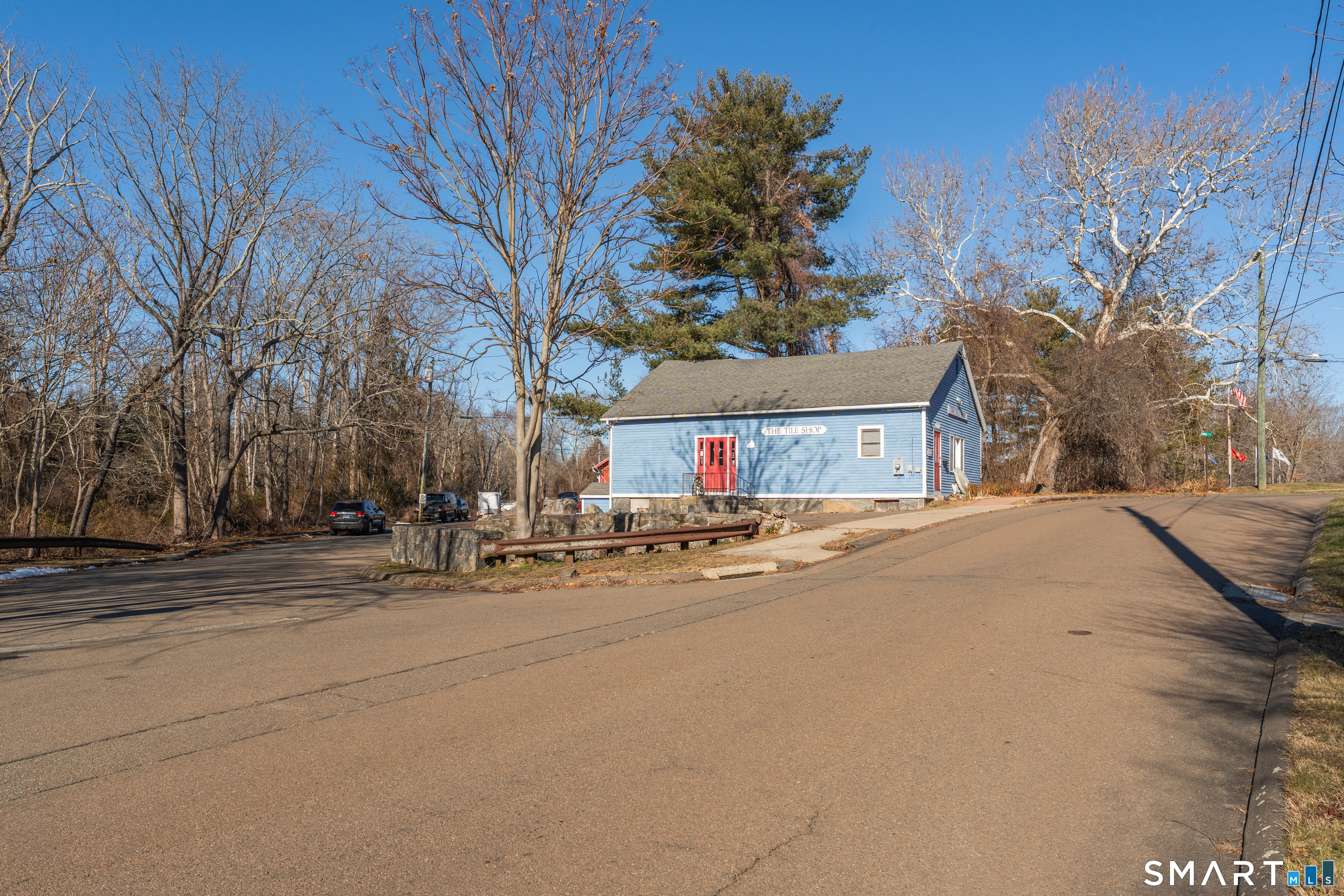 51 Mill Road Guilford, CT 06437 - Photo 4 of 28 a view of road with large trees
