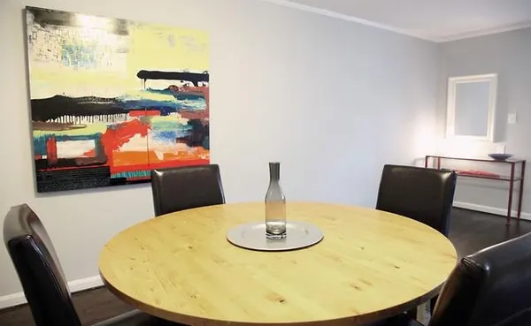 a view of a dining room with furniture