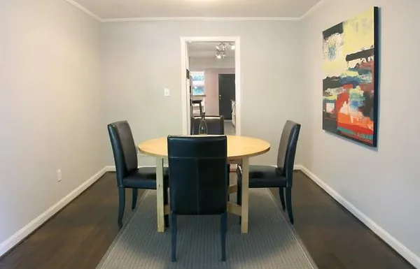 a view of a dining room with furniture