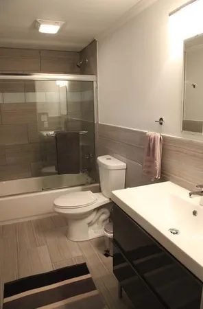 a bathroom with a sink and a toilet