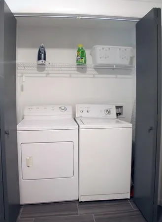 a utility room with dryer and washer