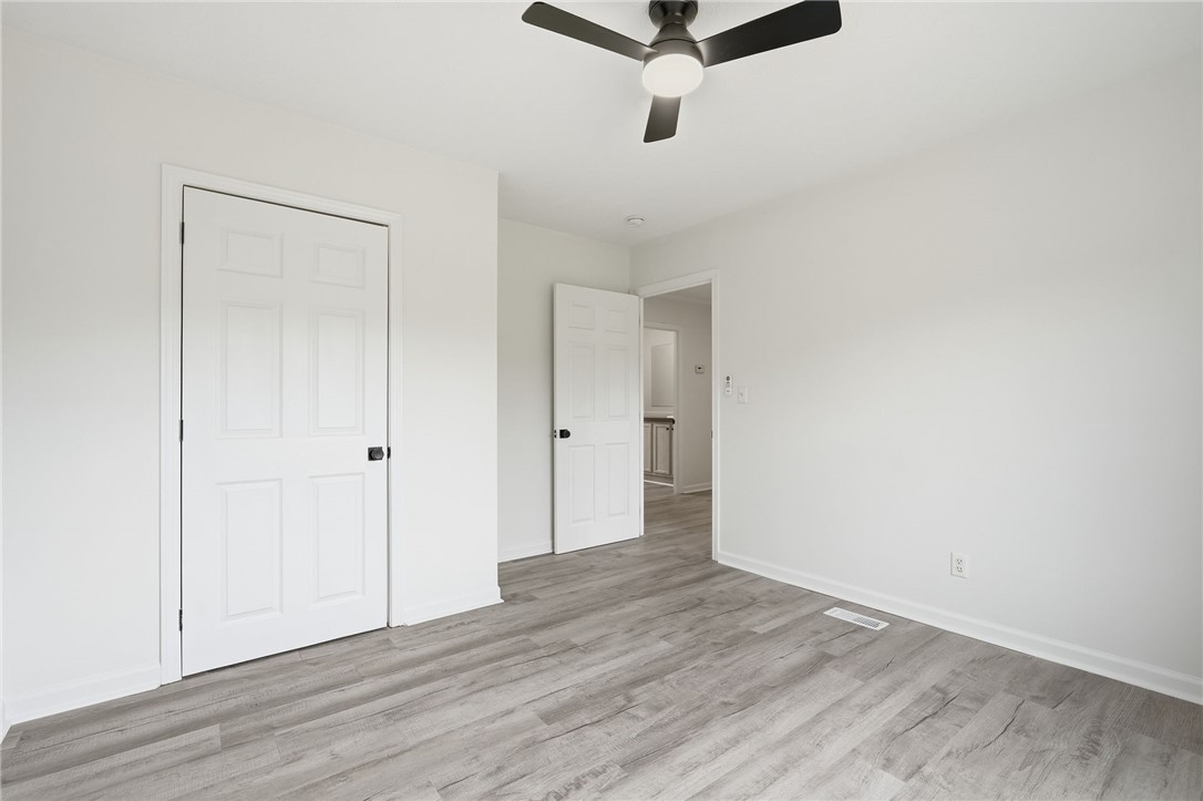 112 Sir Francis Drake Way Liberty, SC 29657 - Photo 24 of 42 This bright room features a ceiling fan and elegant flooring, perfect for a peaceful retreat.