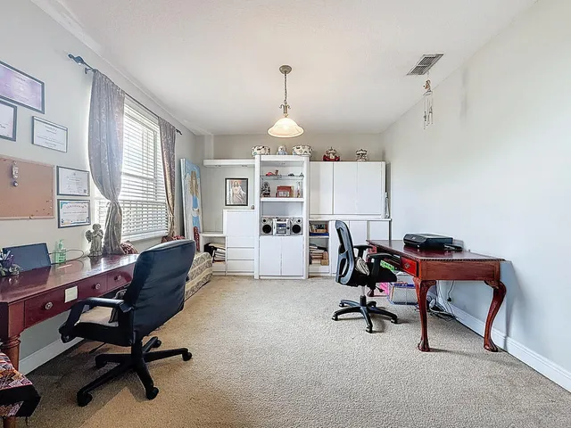 a dining room with furniture mountain view and garden view