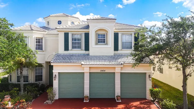 a view of a dining room with furniture window and chandelier