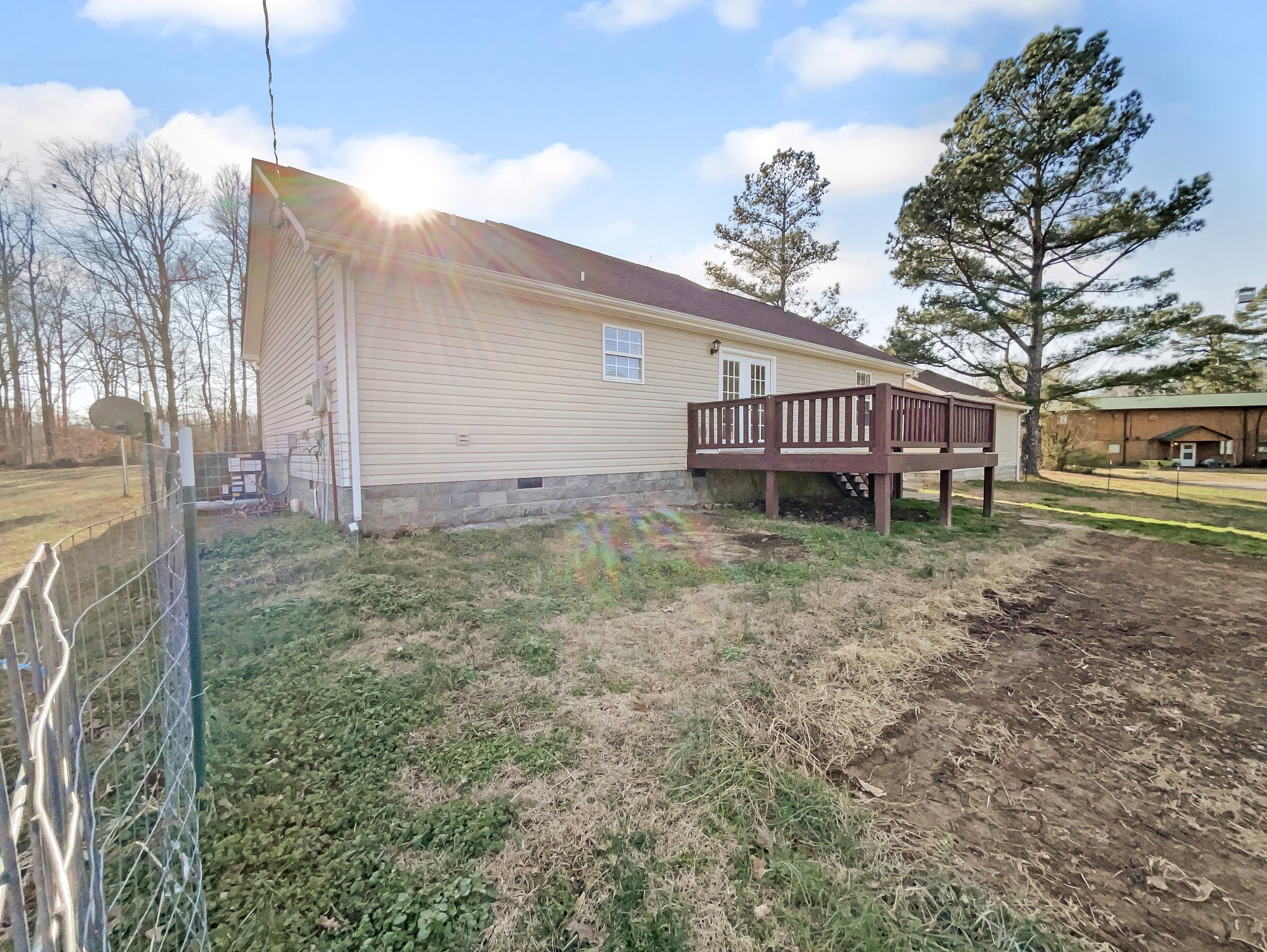 2284 Wiley Pardue Road Ashland City, TN 37015 - Photo 18 of 19 a view of a house with a yard and wooden fence