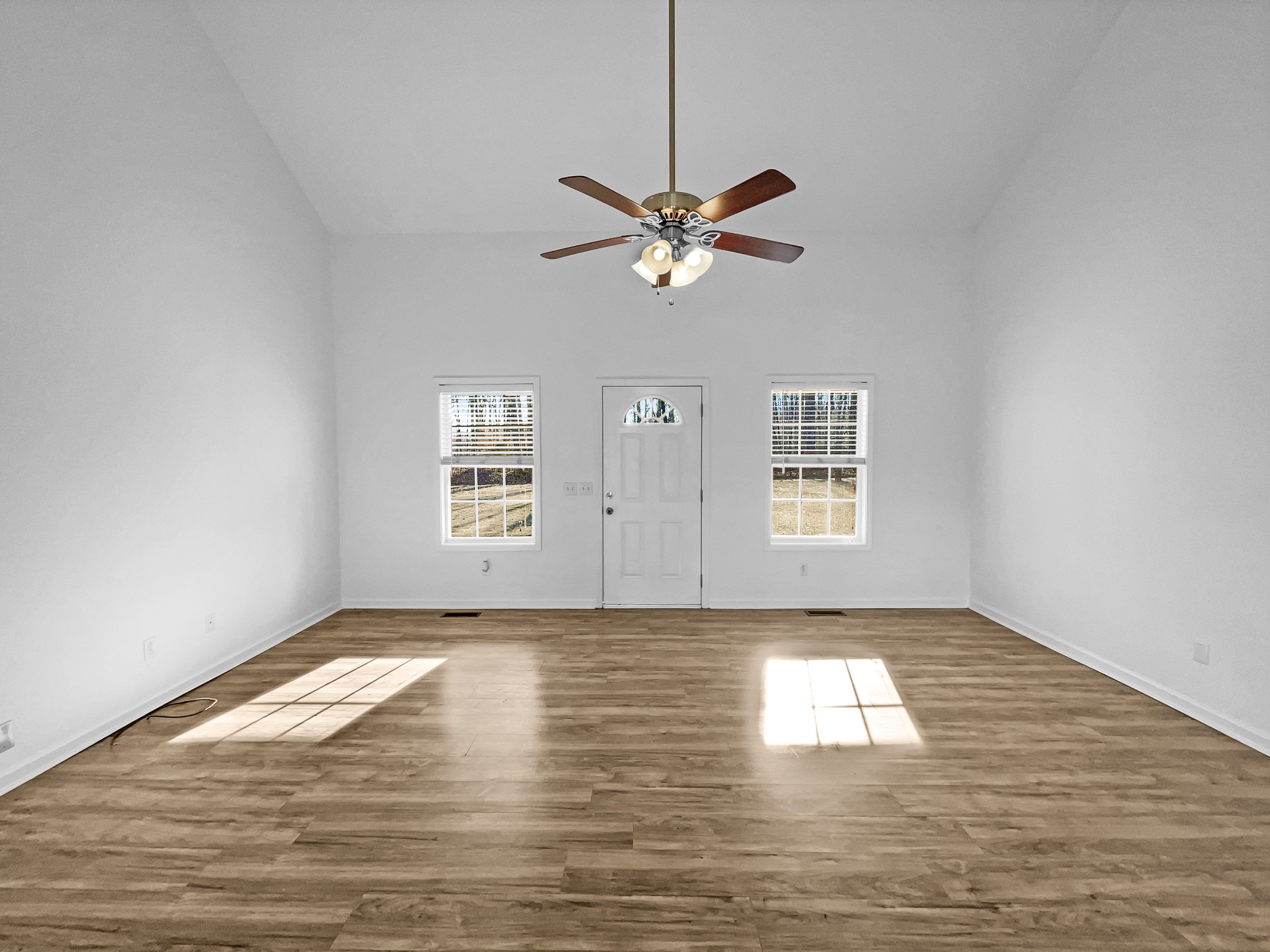 2284 Wiley Pardue Road Ashland City, TN 37015 - Photo 5 of 19 a view of empty room with window and ceiling fan