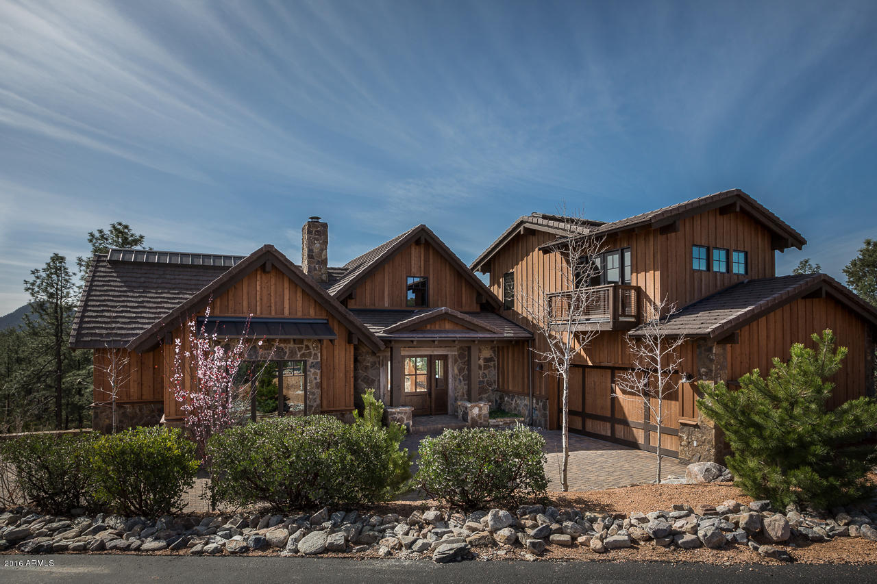 3003 East Arrow Point Payson, AZ 85541 - Photo 1 of 36 a front view of a house with a yard
