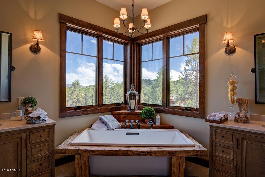 3003 East Arrow Point Payson, AZ 85541 - Photo 11 of 36 a room with a large window and table