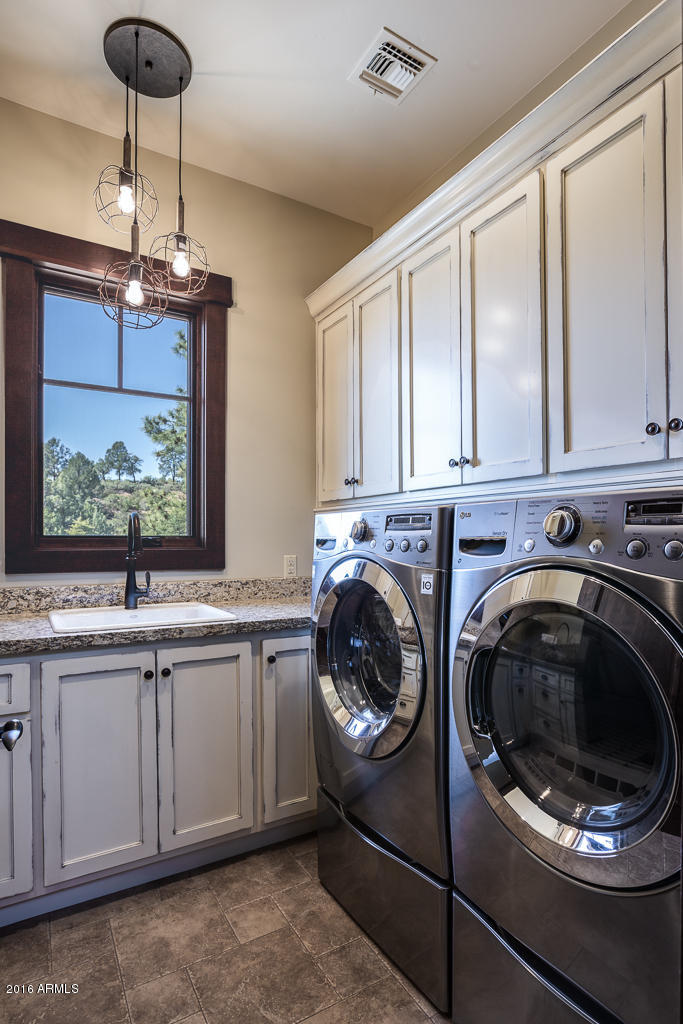 3003 East Arrow Point Payson, AZ 85541 - Photo 14 of 36 a utility room with sink dryer and washer