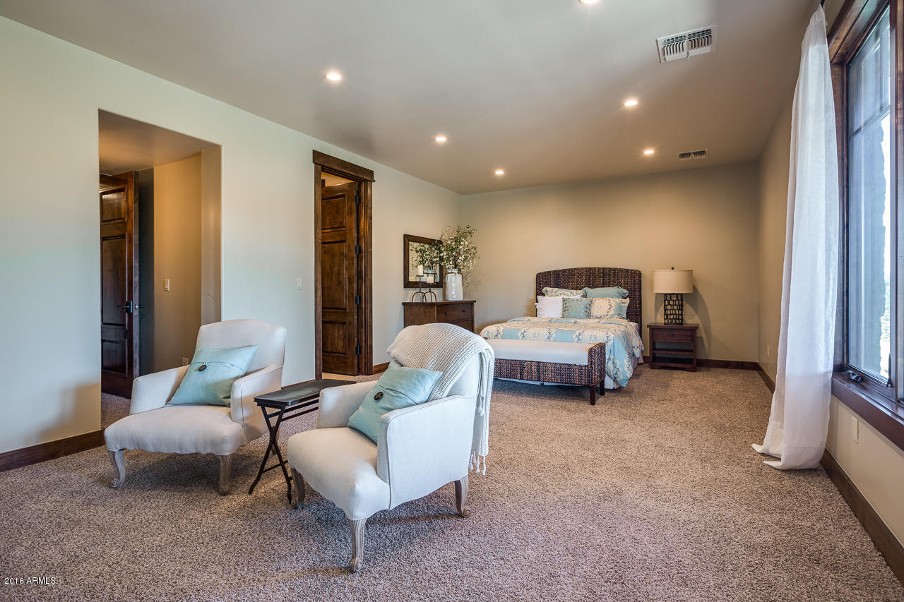 3003 East Arrow Point Payson, AZ 85541 - Photo 20 of 36 a living room with furniture and a chair