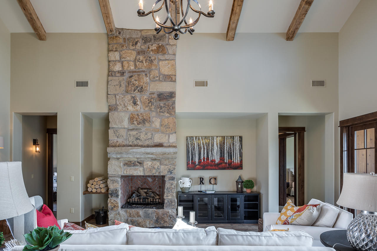 3003 East Arrow Point Payson, AZ 85541 - Photo 4 of 36 a living room with furniture and a fireplace