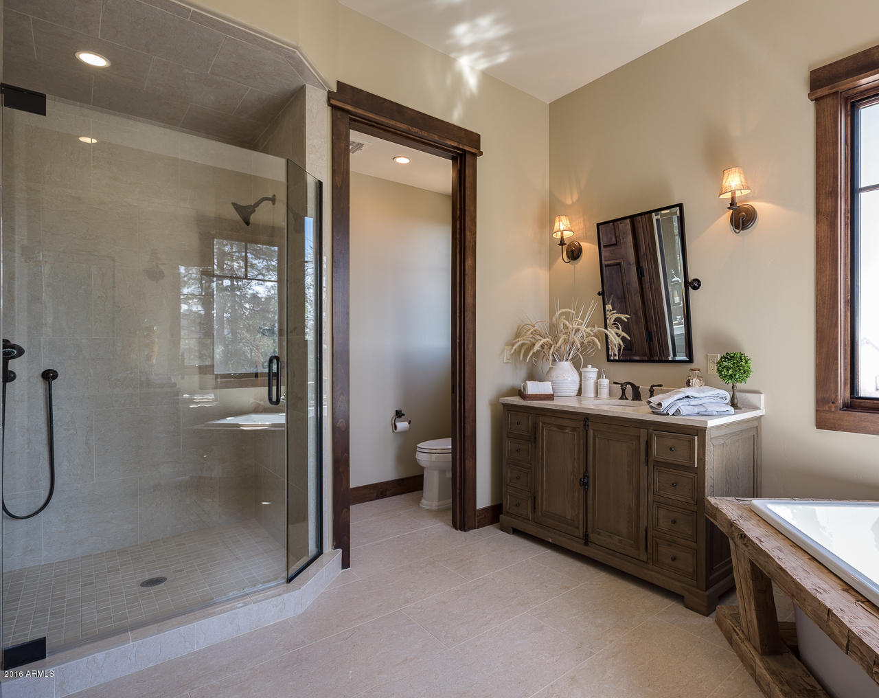 3003 East Arrow Point Payson, AZ 85541 - Photo 10 of 36 a bathroom with a double vanity sink mirror and shower