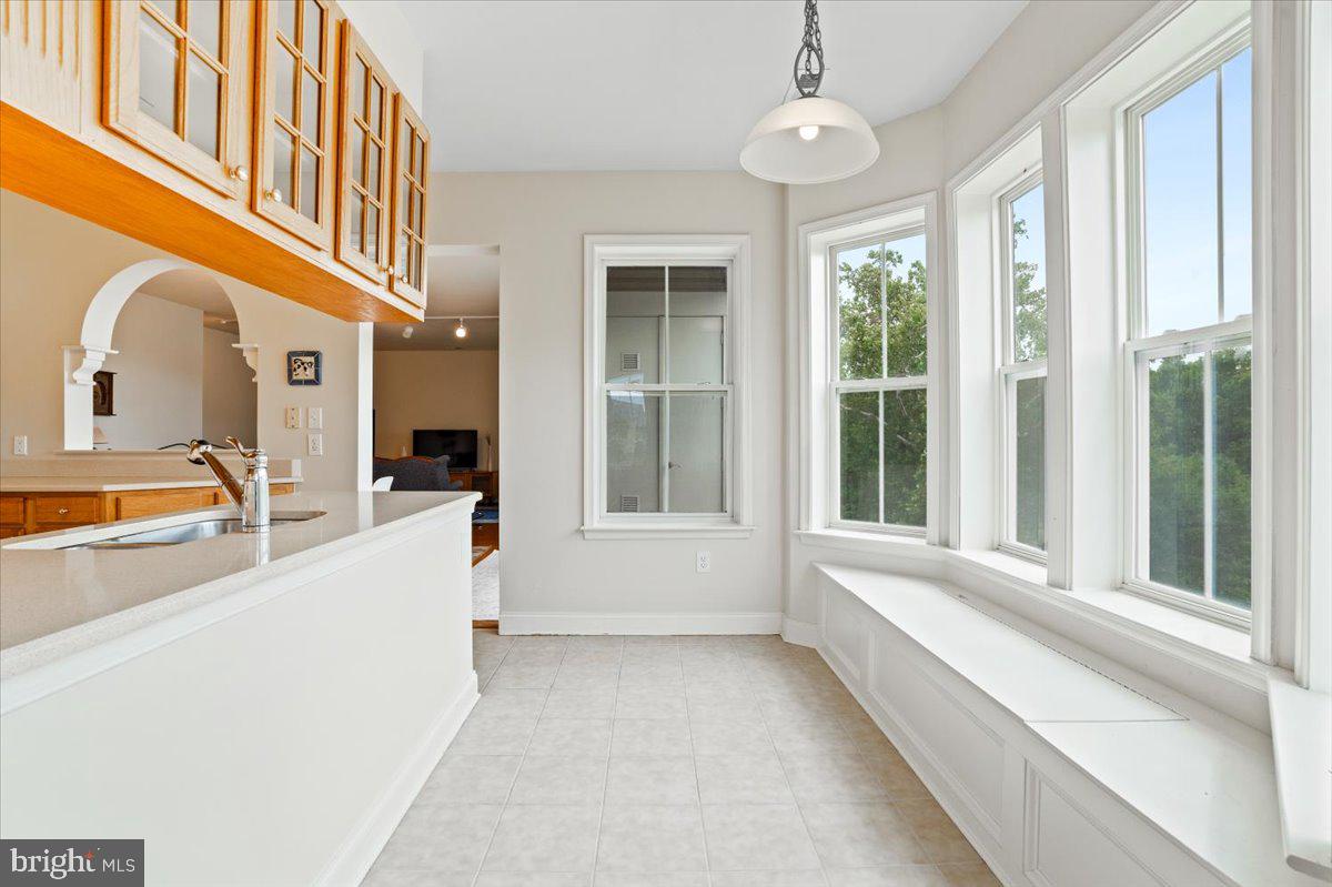 2250 Bear Den Road, Unit 313 Frederick, MD 21701 - Photo 13 of 59 a view of a living room with a large window