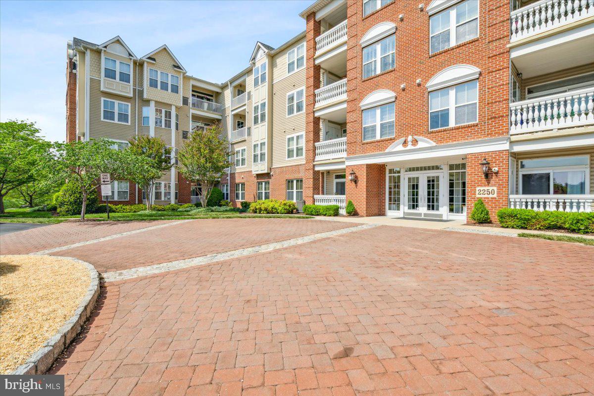 2250 Bear Den Road, Unit 313 Frederick, MD 21701 - Photo 32 of 59 a view of a building with a street