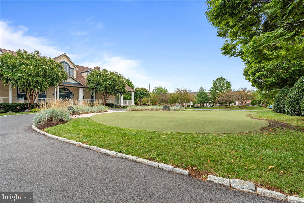 2250 Bear Den Road, Unit 313 Frederick, MD 21701 - Photo 37 of 59 a front view of a house with garden