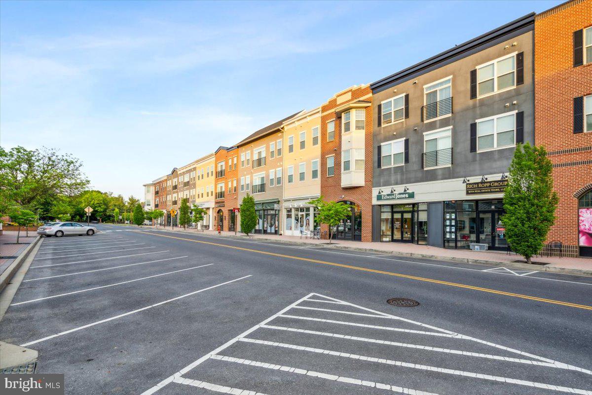 2250 Bear Den Road, Unit 313 Frederick, MD 21701 - Photo 46 of 59 a view of a tall building next to a road