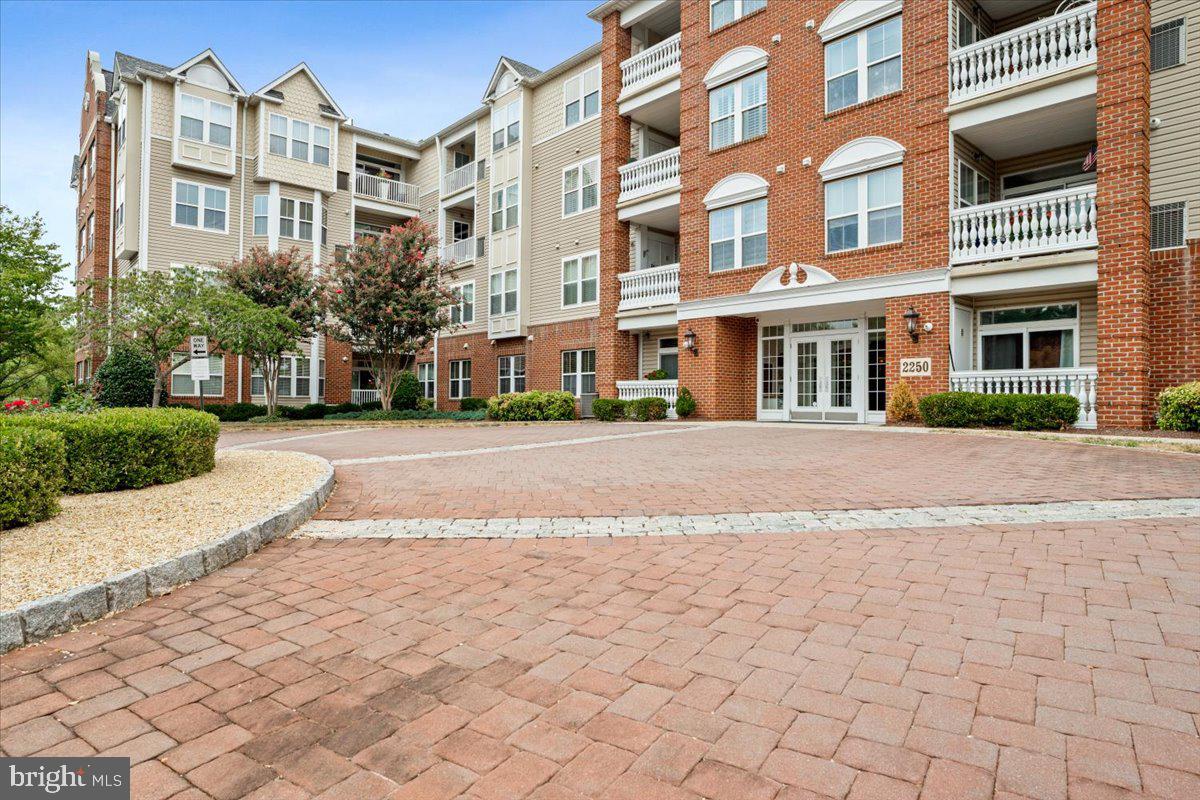 2250 Bear Den Road, Unit 313 Frederick, MD 21701 - Photo 51 of 59 a view of building with a street