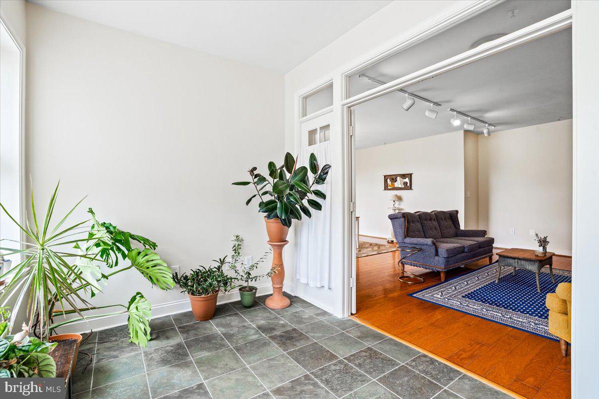 2250 Bear Den Road, Unit 313 Frederick, MD 21701 - Photo 6 of 59 a living room with furniture