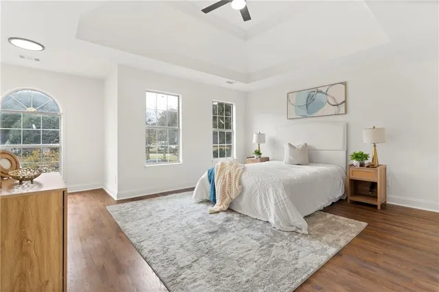 a bathroom with a sink a mirror and a bathtub