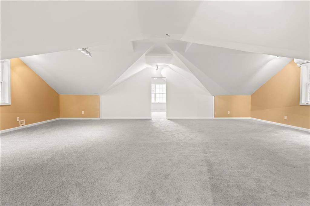 560 Flowering Trail Grayson, GA 30017 - Photo 44 of 68 a view of an empty room with a window