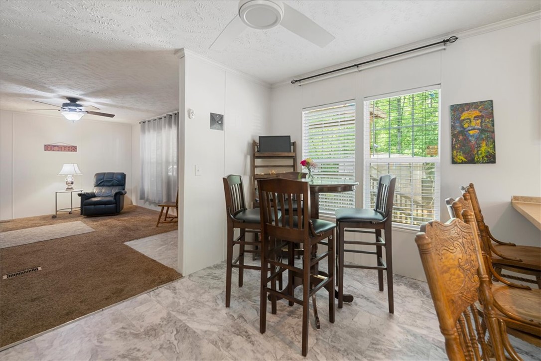 616 Anderson Road Pendleton, SC 29670 - Photo 11 of 29 This bright dining area features ample natural light and seamless flow into the adjacent living space.