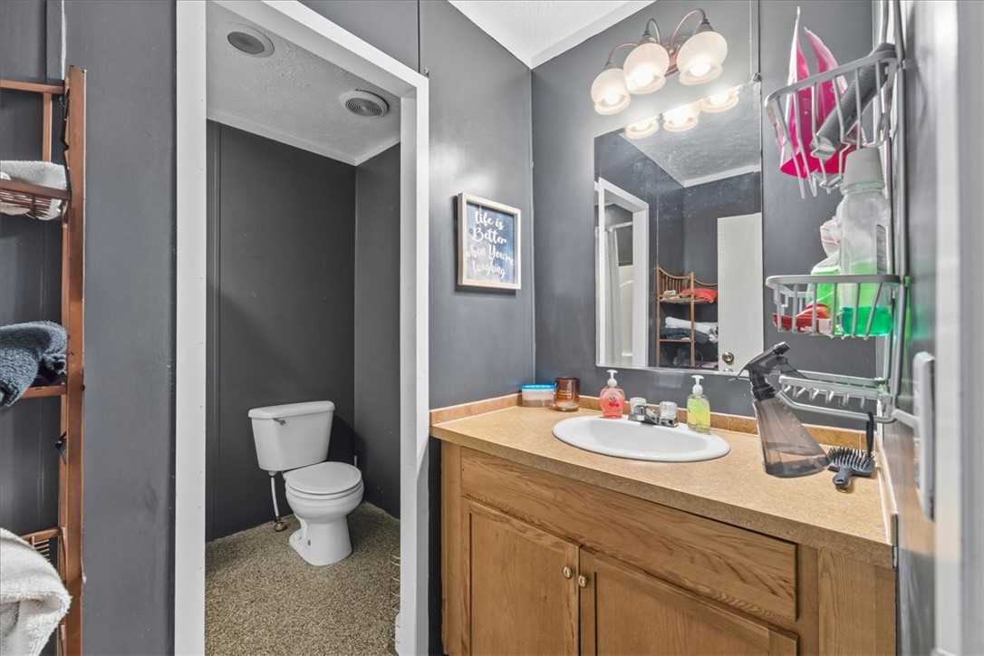 616 Anderson Road Pendleton, SC 29670 - Photo 15 of 29 This bathroom features practical design with a spacious vanity and convenient built-in shelving.