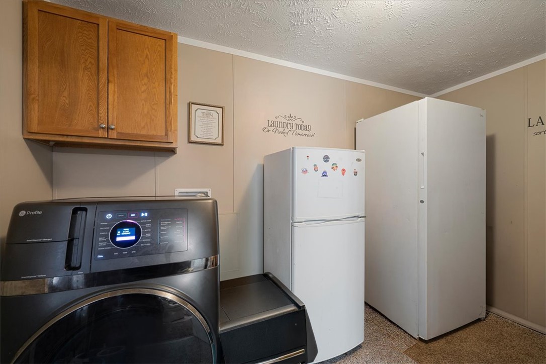 616 Anderson Road Pendleton, SC 29670 - Photo 19 of 29 This dedicated space offers convenience for daily chores.