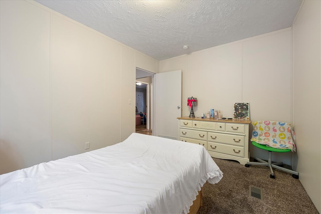 616 Anderson Road Pendleton, SC 29670 - Photo 28 of 29 This cozy bedroom offers a tranquil retreat for rest and relaxation.