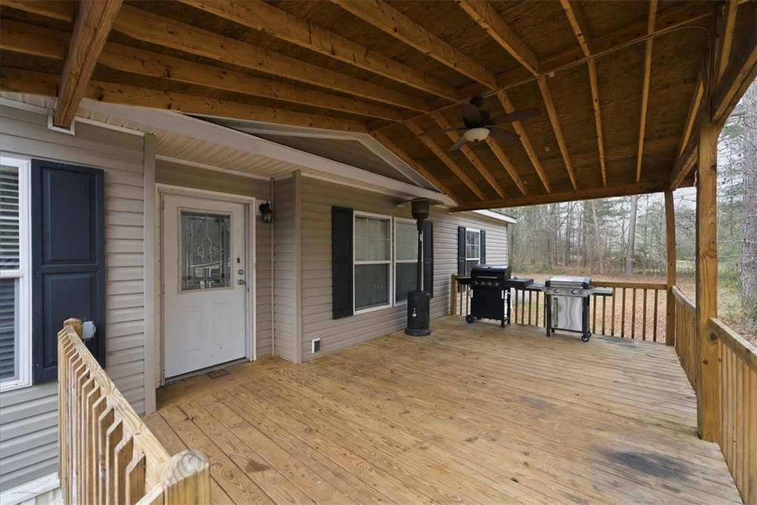 616 Anderson Road Pendleton, SC 29670 - Photo 4 of 29 This spacious wooden deck offers abundant space for outdoor living.