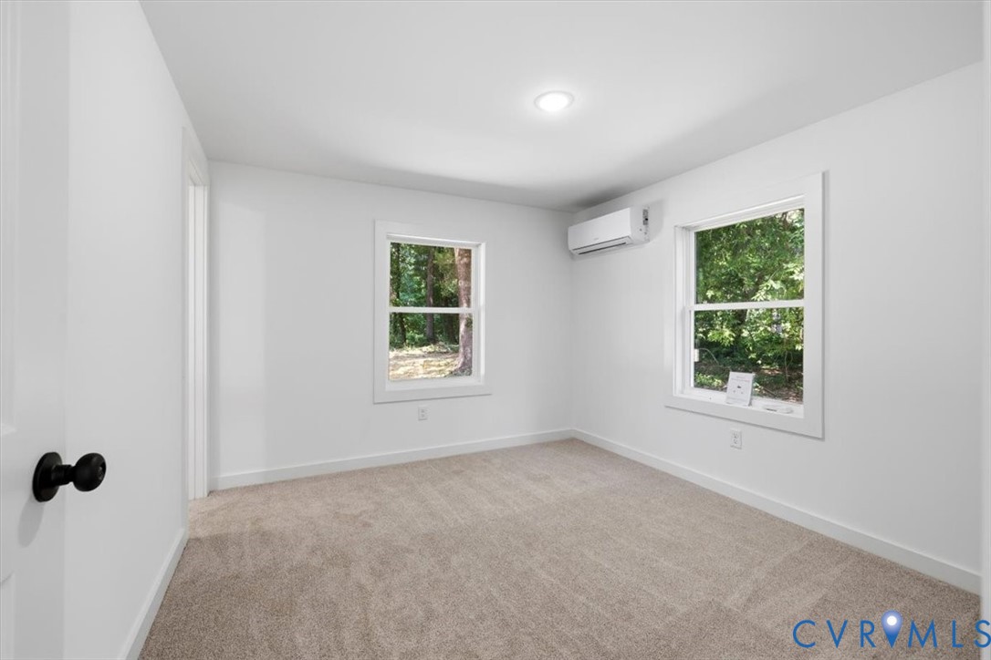 15221 Wright Road Amelia Court House, VA 23002 - Photo 17 of 22 Light-filled interior space featuring new neutral-