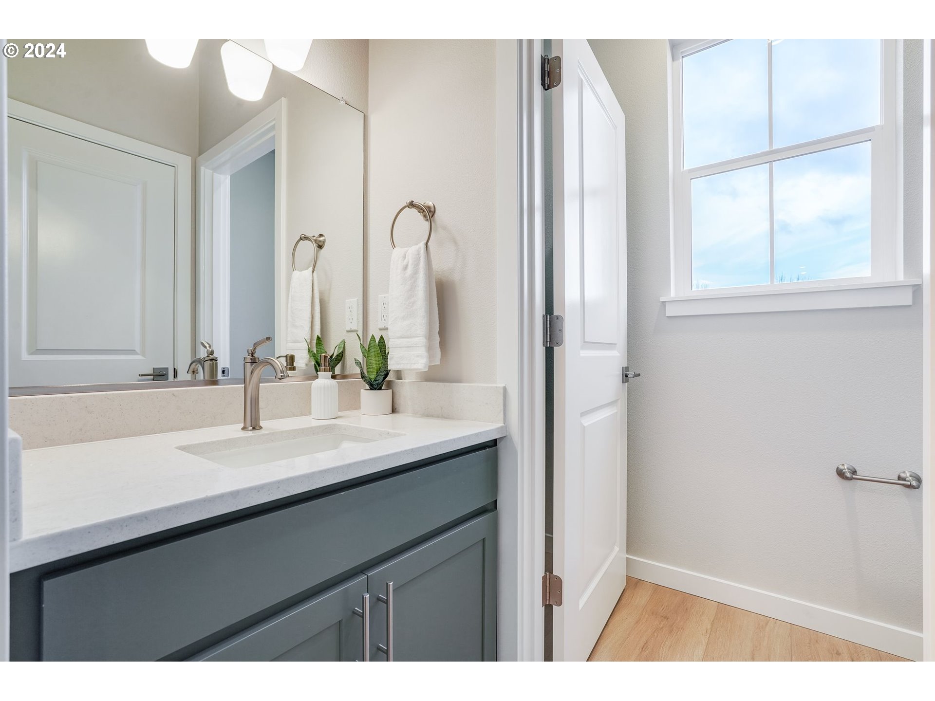 13167 Southwest Carmel Street Tigard, OR 97224 - Photo 27 of 48 a bathroom with a sink and a mirror