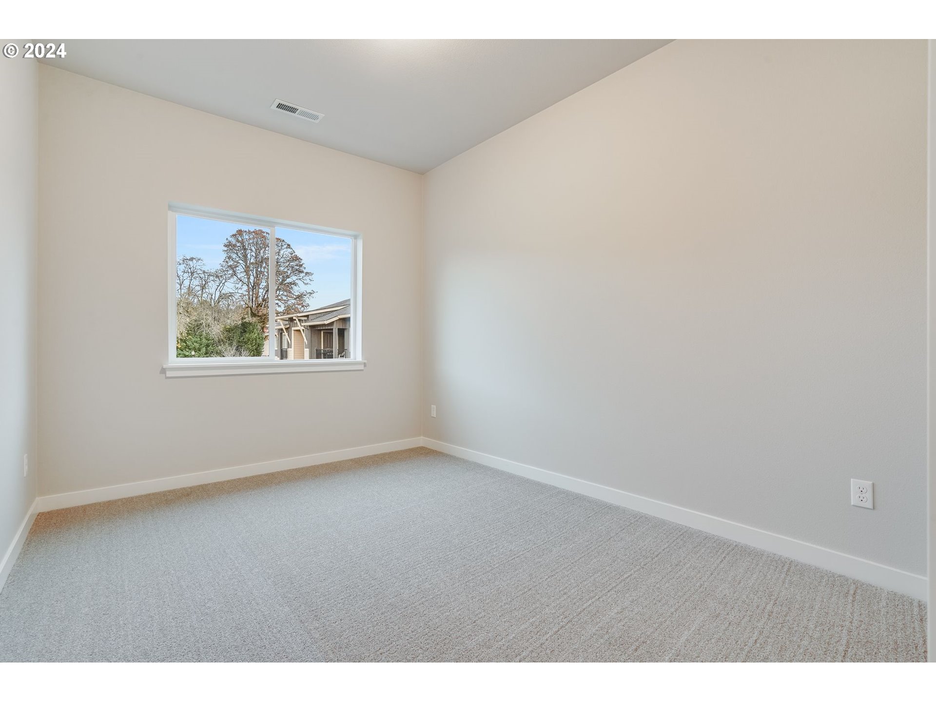13167 Southwest Carmel Street Tigard, OR 97224 - Photo 33 of 48 a view of an empty room with a window