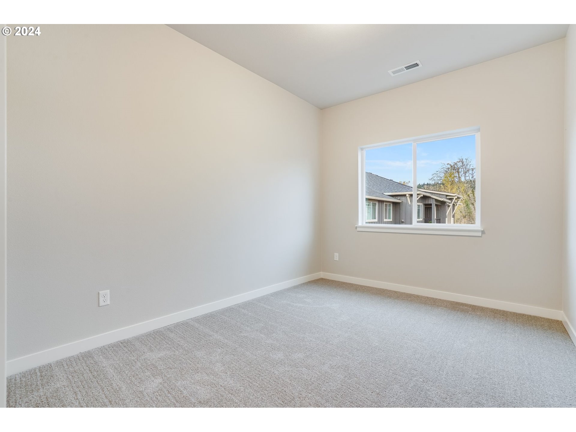 13167 Southwest Carmel Street Tigard, OR 97224 - Photo 35 of 48 a view of an empty room with a window
