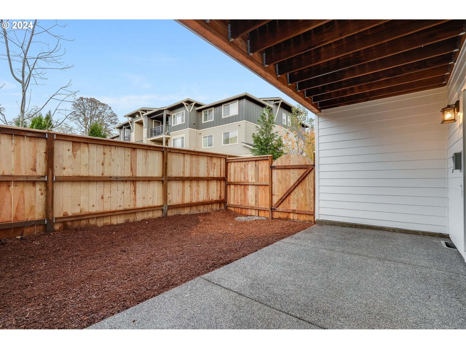 13167 Southwest Carmel Street Tigard, OR 97224 - Photo 9 of 48 a view of a backyard