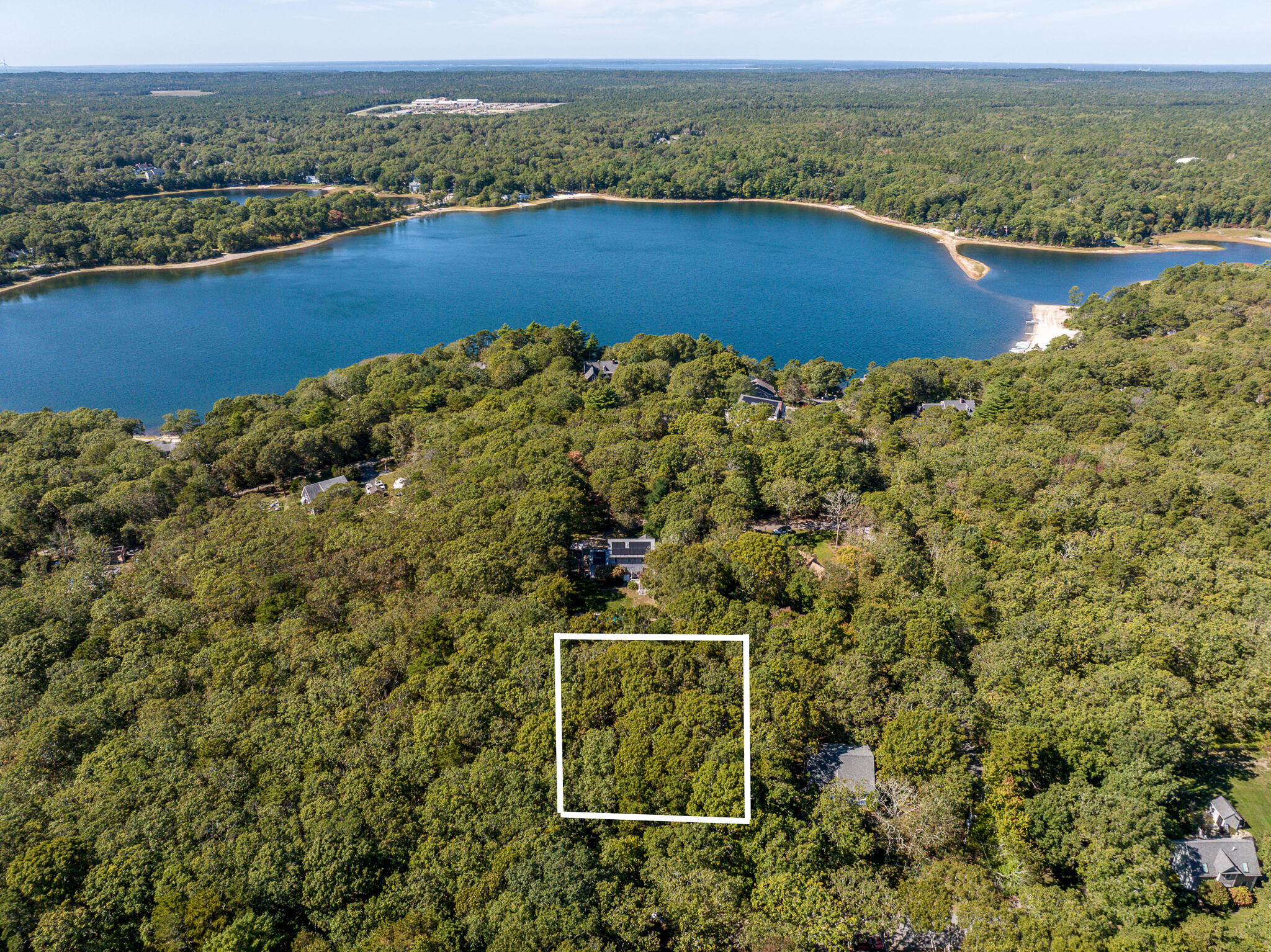 4 Faith Lane Sandwich, MA 02644 - Photo 5 of 7 an aerial view of a houses with a lake view