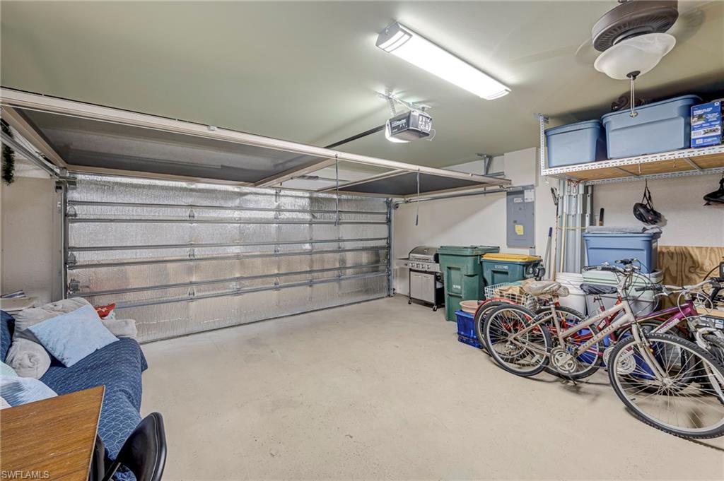 4149 Madison Street Ave Maria, FL 34142 - Photo 32 of 36 Insulated Garage Door & Attic