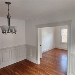 107 Wrentham Street, Unit 2 Boston, MA 02124 - Photo 15 of 20 a view of empty room with wooden floor and fan