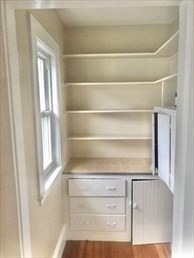 107 Wrentham Street, Unit 2 Boston, MA 02124 - Photo 20 of 20 a view of walk in closet with empty racks